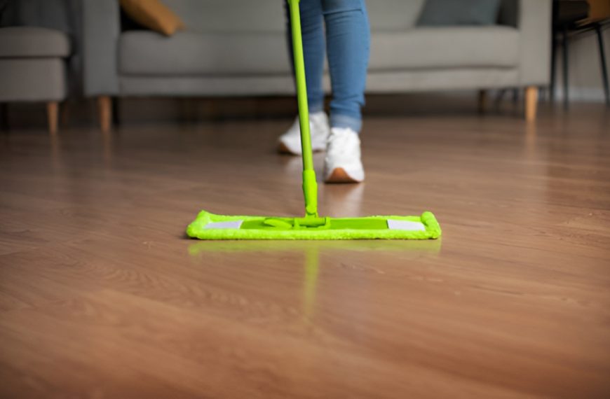 woman mopping vinyl flooring